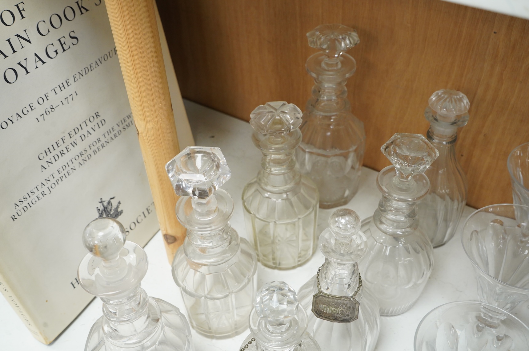 A collection of 19th century and later glassware, to include: Three fluted wine glasses two rummers, various risers and finger bows, decanters etc